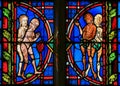 Adam and Eve - Stained Glass in Tours Cathedral Royalty Free Stock Photo