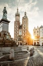 Adam Mickiewicz monument and St. Mary`s Basilica on Main Square in Krakow