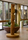 `Adam`, a wooden semi-abstract sculpture by American artist Helen Phillips in Dallas, Texas