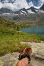 Adamello group, Italian Alps, hiker resting feet