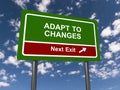 adapt to changes next exit traffic sign on blue sky Royalty Free Stock Photo