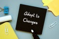 Adapt to Changes sign on the sheet Royalty Free Stock Photo