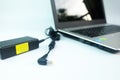 Adapter power cord charger of laptop computer On White Royalty Free Stock Photo