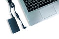 Adapter power cord charger of laptop computer On White floor Royalty Free Stock Photo