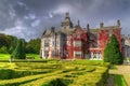 Adare castle in red ivy with gardens Royalty Free Stock Photo