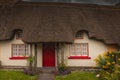 Adare, Ireland. Thatched cottage in the picturesque Village of Adare, Co. Limerick full of flowers in front garden 2019 Ireland,