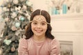 Add some glitz and glam to your look. Happy girl smile with Christmas look. New year eve party look of small child. Give Royalty Free Stock Photo