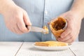 Add to ruddy toast peanut butter, hand, delicious breakfast Royalty Free Stock Photo