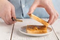 Add to ruddy toast peanut butter, hand, delicious breakfast Royalty Free Stock Photo