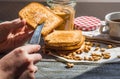 Add to ruddy toast peanut butter, hand, delicious breakfast Royalty Free Stock Photo