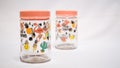 Glass Jars with Fruit and Animal Motif: A Playful Storage Solution