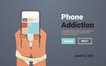 addicted human hands tied with rope using smartphone social media networks digital addiction concept