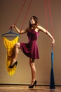 Addicted to shopping woman girl marionette with clothes Royalty Free Stock Photo