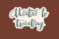 Addicted to travelling lettering on brown background