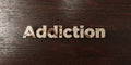 Addiction - grungy wooden headline on Maple - 3D rendered royalty free stock image