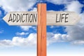 Addiction or life - wooden signpost Royalty Free Stock Photo