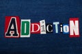 ADDICTION text word collage, colorful fabric on blue denim, abuse and treatment concept Royalty Free Stock Photo