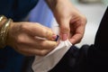 Adding a Cufflink Royalty Free Stock Photo