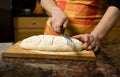 Adding cut to unbaked bread dough