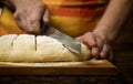 Adding cut to unbaked bread dough