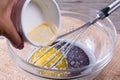 Adding Melted Butter To Cake Mix Royalty Free Stock Photo