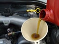 Adding Motor Oil to Car Closeup Royalty Free Stock Photo