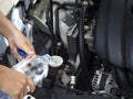 Adding water to the car radiator should open the hood once a week to observe the water in the radiator. And reserve water tank In