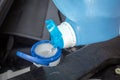 Adding windscreen washer fluid in the car Royalty Free Stock Photo