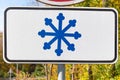 Additional road sign warns about risk of snow and ice