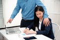 Addressing workplace sexual harassment is Asian pretty woman secretary suffer assault and harassment from boss is a Harassment and Royalty Free Stock Photo