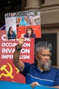 Middle-age Uyghur men in a demonstration urging the Australian community and governemt nto concern the Uyghur genocide in China