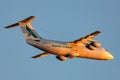 Australian Air Express National Jet Systems British Aerospace 146-300 aircraft VH-NJF taking off from Adelaide Airport at sunset