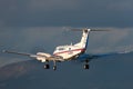 Royal Flying Doctors Service of Australia Beechcraft Super King Air 200 twin engined turboprop aircraft on approach to land at Ade