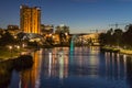 Adelaide city CBD at sunrise view across Torrens river from park footbridge.Adelaide, Australia Royalty Free Stock Photo