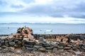 Adelie penguins - Pygoscelis adeliae - wildlife at rocks and old decompost house of whalers on Paulet Island, Antarctica Royalty Free Stock Photo