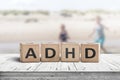 ADHD sign on a wooden table with kids Royalty Free Stock Photo