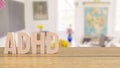 Adhd wood text on table in class room for medical or education concept 3d rendering