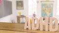 Adhd wood text on table in class room for medical or education concept 3d rendering