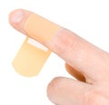 Adhesive bandage on finger Royalty Free Stock Photo