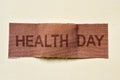 Adhesive bandage with the text health day