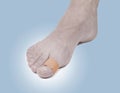Adhesive Healing plaster on foot finger. Royalty Free Stock Photo