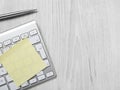 Adhesive note on keyboard Royalty Free Stock Photo