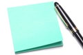 Adhesive note and pen Royalty Free Stock Photo