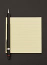 Adhesive note and pen Royalty Free Stock Photo
