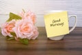 Adhesive paper note on coffee mug with text - Good morning Royalty Free Stock Photo