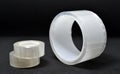Adhesive tape on a black background. Rolls of transparent tape. Scotch tape on a black background Royalty Free Stock Photo