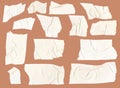 Adhesive tape pieces on orange background. Masking paper tape torn and wrinkled pieces set