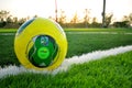 Adidas ball on green grass