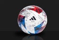 An adidas Major League Soccer Official MLS Pro Match Ball for the 2023 season on a black