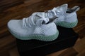 Adidas shoes Alphaedge 4D in white and green.